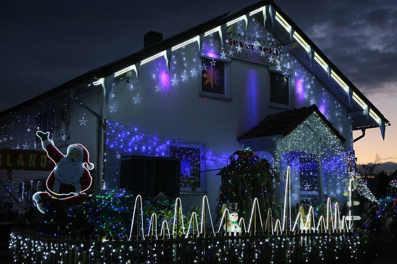 this image shows fence line Christmas lights installation in Cameron Park, CA