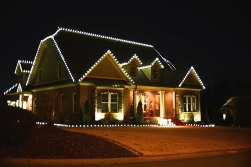 Roofline and yard Christmas lights for Cool Christmas light installation by Glow Up Christmas Lights