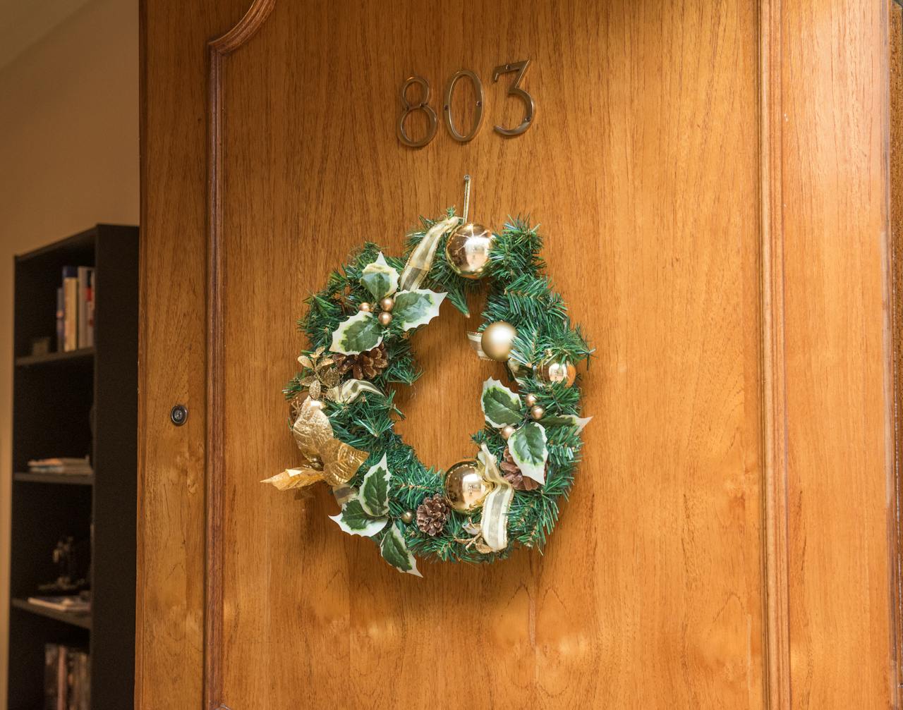 this image shows Christmas wreath hanging in Cameron Park, CA